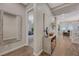 Bright and spacious entryway with large mirror and console table at 6411 Wild Blue Ct, Las Vegas, NV 89135