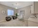 Modern home office with built-in cabinetry and seating at 6411 Wild Blue Ct, Las Vegas, NV 89135