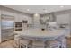 Gourmet kitchen boasts a large island and modern cabinetry at 6411 Wild Blue Ct, Las Vegas, NV 89135