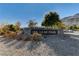 Stone entrance sign welcomes visitors to Oak Leaf Park at 6411 Wild Blue Ct, Las Vegas, NV 89135