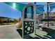 Modern shaded playground with climbing structures and slides at 6411 Wild Blue Ct, Las Vegas, NV 89135