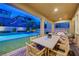 Stunning pool and patio area with outdoor dining at 6411 Wild Blue Ct, Las Vegas, NV 89135