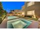 Luxury backyard with pool, spa, and string lights at 6411 Wild Blue Ct, Las Vegas, NV 89135