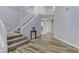 Open staircase with white railing and hardwood floors at 8774 Libertyvale Dr, Las Vegas, NV 89123