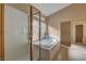 Clean bathroom with a shower and bathtub at 2134 Eaglepath Cir, Henderson, NV 89074