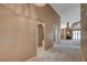 Bright hallway with neutral walls and carpet leading to other rooms at 2134 Eaglepath Cir, Henderson, NV 89074