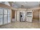 Bright kitchen with stainless steel appliances and white cabinets at 2134 Eaglepath Cir, Henderson, NV 89074