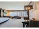 Open concept bedroom with sitting area and city views at 2600 W Harmon Ave # 24010, Las Vegas, NV 89158