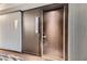 Private entryway with modern door and hallway at 2600 W Harmon Ave # 24010, Las Vegas, NV 89158