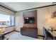 Relaxing living area features large TV and city views at 2600 W Harmon Ave # 24010, Las Vegas, NV 89158