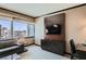 Living room with large window showcasing city views at 2600 W Harmon Ave # 24010, Las Vegas, NV 89158