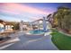 Backyard featuring a pool, patio and well-maintained landscaping at 2868 Vista Del Sol Ave, Las Vegas, NV 89120