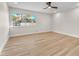 Bright bedroom featuring neutral colors and wood floors at 2868 Vista Del Sol Ave, Las Vegas, NV 89120