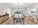 Dining room with a modern lighting fixture and lots of natural light at 2868 Vista Del Sol Ave, Las Vegas, NV 89120