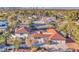 Beautifully landscaped property featuring a red tile roof, circular driveway, and mature trees at 2868 Vista Del Sol Ave, Las Vegas, NV 89120
