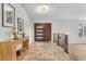 Bright foyer with hardwood floors, modern light fixtures, and stylish decor at 2868 Vista Del Sol Ave, Las Vegas, NV 89120
