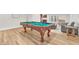 Finished basement featuring a classic pool table, perfect for recreation and entertainment at 2868 Vista Del Sol Ave, Las Vegas, NV 89120