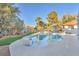 Inviting pool and manicured landscape create a serene backyard oasis at 2868 Vista Del Sol Ave, Las Vegas, NV 89120