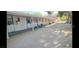 Row of horse stables with covered walkways at 2868 Vista Del Sol Ave, Las Vegas, NV 89120