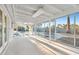 Bright sunroom featuring large glass doors and windows, offering seamless indoor-outdoor living at 2868 Vista Del Sol Ave, Las Vegas, NV 89120