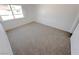 Bright and airy bedroom with neutral carpeting and large window at 3004 El Camino Ave, Las Vegas, NV 89102