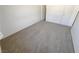 Spacious bedroom with neutral carpeting and ample closet space at 3004 El Camino Ave, Las Vegas, NV 89102