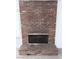 Brick fireplace with brass screen at 3004 El Camino Ave, Las Vegas, NV 89102