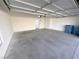 Attached garage with ample space and overhead storage at 3004 El Camino Ave, Las Vegas, NV 89102