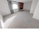 Bright living room featuring a brick fireplace and large window at 3004 El Camino Ave, Las Vegas, NV 89102