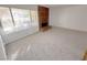 Living room with brick fireplace and window at 3004 El Camino Ave, Las Vegas, NV 89102