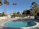 Inviting community pool with palm trees at 3004 El Camino Ave, Las Vegas, NV 89102