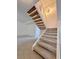 Indoor view of a carpeted staircase with a chandelier above at 3004 El Camino Ave, Las Vegas, NV 89102