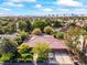 Stunning aerial view of the property with the Las Vegas skyline in the distance at 3841 Hildebrand Ln, Las Vegas, NV 89121