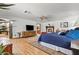 Bright main bedroom with hardwood floors, ceiling fan, and neutral decor at 3841 Hildebrand Ln, Las Vegas, NV 89121