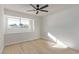 Bright bedroom with window seat and ceiling fan at 2368 Winterwood Blvd, Las Vegas, NV 89142