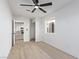 Bedroom showcases a modern ceiling fan and light wood floors at 2368 Winterwood Blvd, Las Vegas, NV 89142