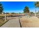 Outdoor exercise equipment sits on a sand base near a walkway, promoting healthy living within the community at 2368 Winterwood Blvd, Las Vegas, NV 89142