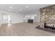 Bright living room with stone fireplace and hardwood floors at 2368 Winterwood Blvd, Las Vegas, NV 89142