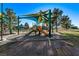 Colorful playground with shade canopies, offering a fun and safe recreational area for children at 2368 Winterwood Blvd, Las Vegas, NV 89142