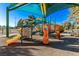 Modern playground featuring slides, climbing structures, and shade at 2368 Winterwood Blvd, Las Vegas, NV 89142