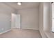 Well-lit bedroom with neutral walls and carpet at 2410 Encouraging Ct, Henderson, NV 89052