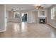 Living room with tile floors, fireplace, and sliding glass doors at 2410 Encouraging Ct, Henderson, NV 89052