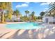 Community pool with palm trees and a relaxing atmosphere at 2410 Encouraging Ct, Henderson, NV 89052