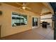 Covered patio has ceiling fans, grill and sliding glass door into the house at 2820 Goldcreek St, Henderson, NV 89052