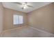 Neutral bedroom with large window and a ceiling fan providing great lighting at 2820 Goldcreek St, Henderson, NV 89052