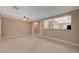 Open-concept living room featuring tile floors and a view to the kitchen at 2820 Goldcreek St, Henderson, NV 89052