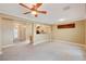 Spacious living room featuring recessed lighting, tile flooring, and seamless access to kitchen and entry at 2820 Goldcreek St, Henderson, NV 89052