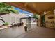 Relaxing covered patio area with a gazebo, lush greenery, and seating at 2820 Goldcreek St, Henderson, NV 89052