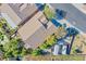 Aerial view of a house and surrounding landscape, including yard and driveway at 5912 Sea Hunter St, North Las Vegas, NV 89031