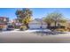 Two-story house with a double garage and landscaping at 5912 Sea Hunter St, North Las Vegas, NV 89031